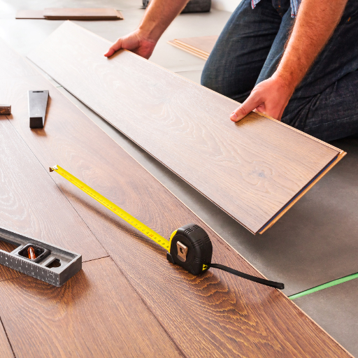 Laying floor tiles